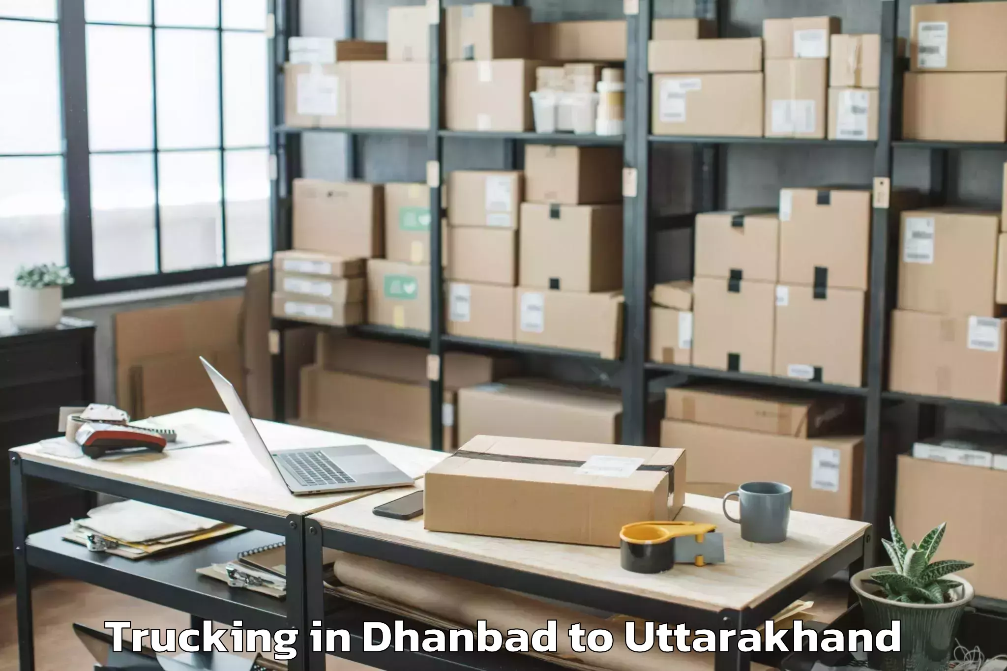 Book Dhanbad to Tharali Trucking Online